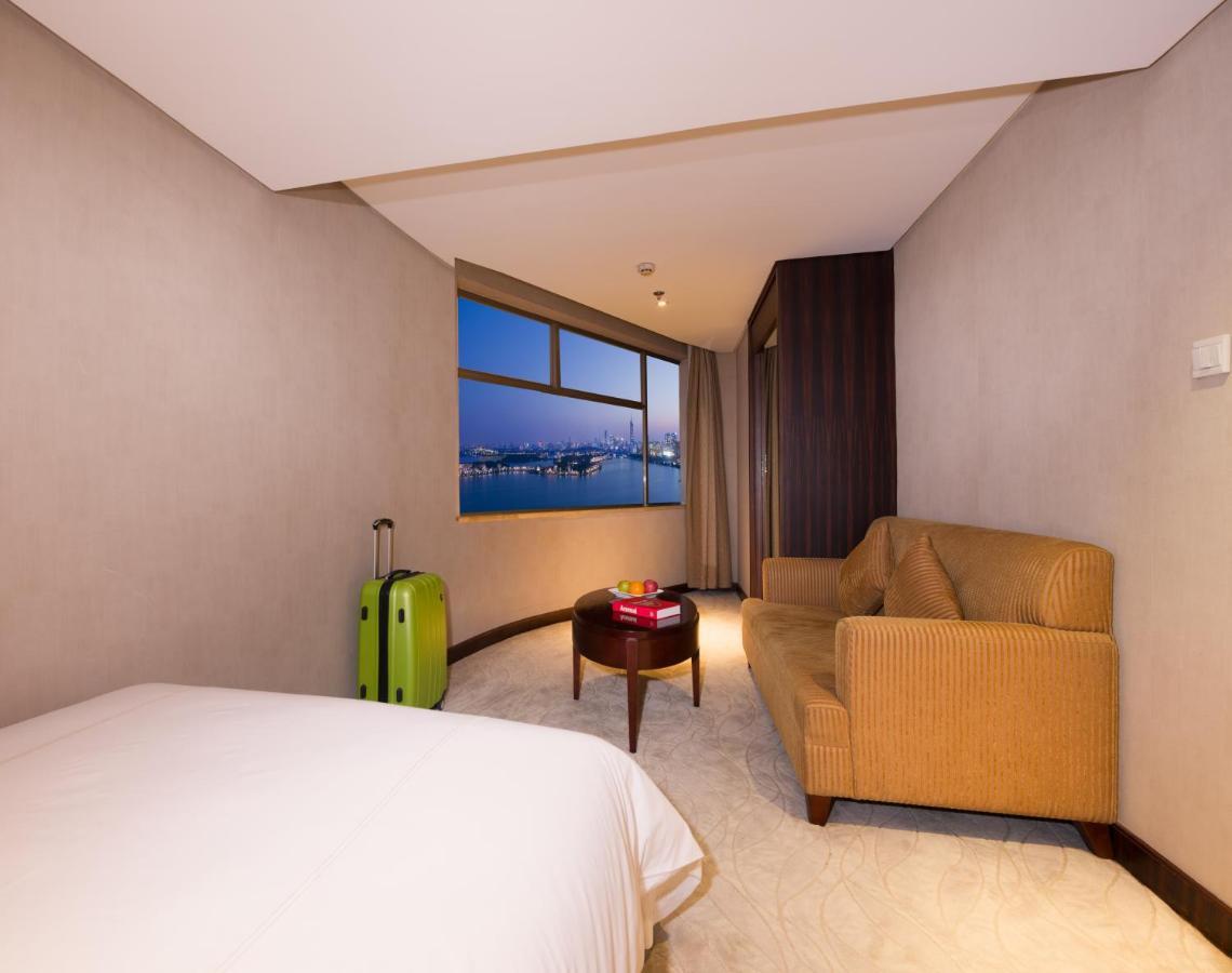 Shu Guang International Hotel Нанкин Экстерьер фото