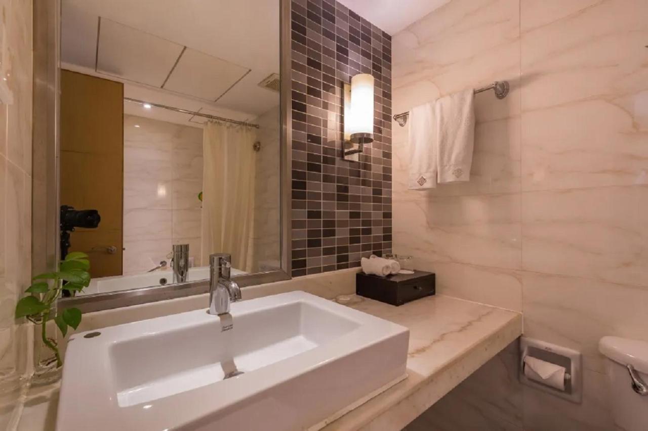 Shu Guang International Hotel Нанкин Экстерьер фото
